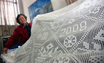 七旬老太鉤出奧運大臺布